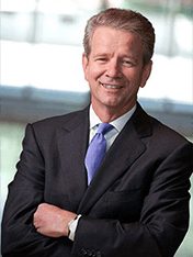 man wearing a blue tie